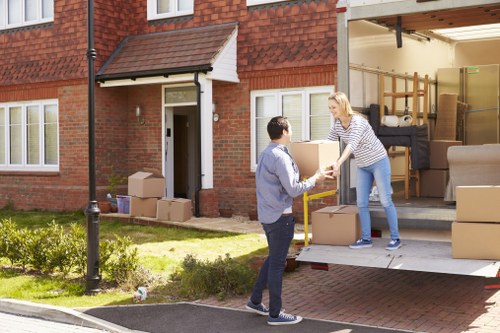 Removal van and moving boxes in a Hillingdon residential street
