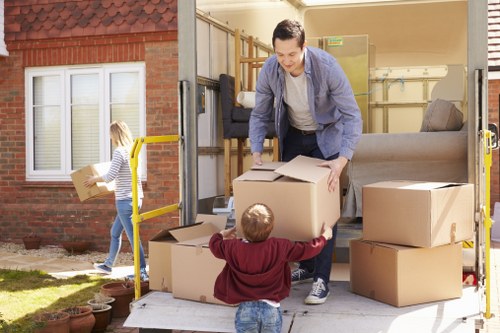 Packed boxes and furniture ready for loading in Hillingdon
