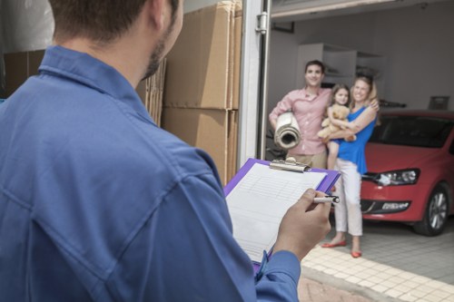 Staff securing items safely inside a moving van