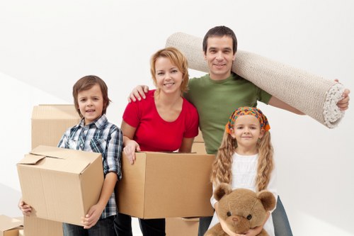 A local moving crew transporting boxes and furniture across Hillingdon