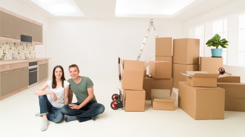 Loading packed household items into a removals vehicle in Hillingdon
