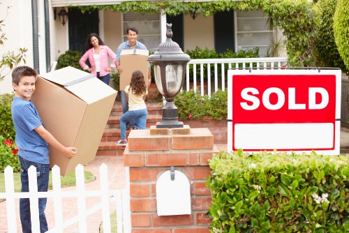 Driver handling household items for a move across Hillingdon