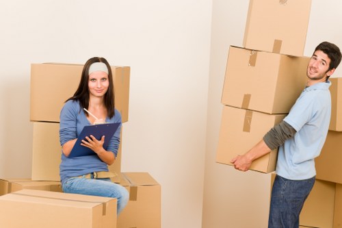 Furniture and boxes being measured for a cubic-yard quote
