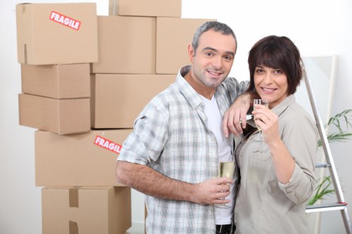 Professional movers handling commercial items and office furniture